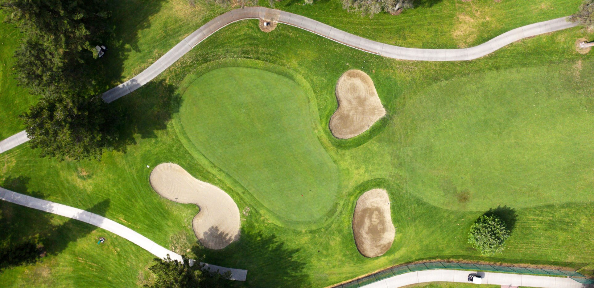 Aerial view of golf course with bunkers